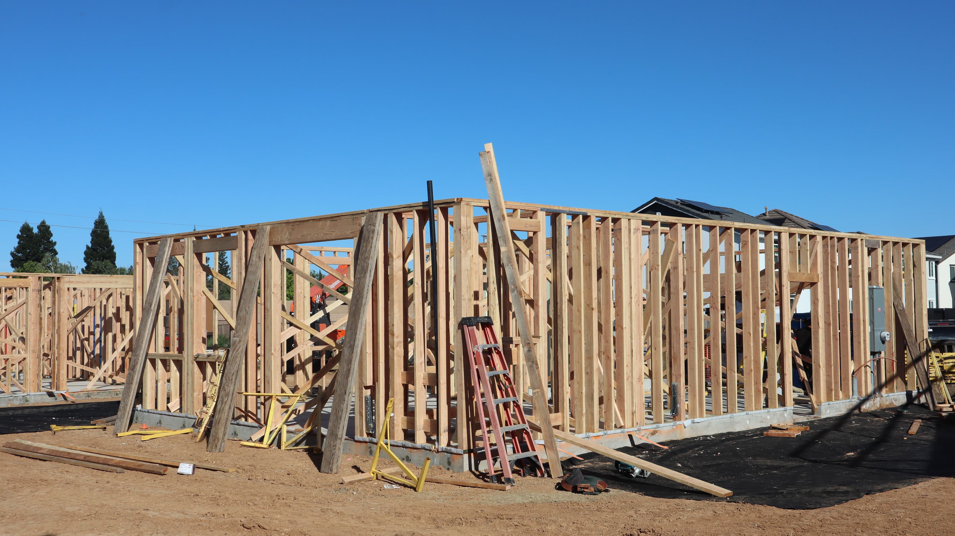 Wood framing and temporary bracing at a new home construction site