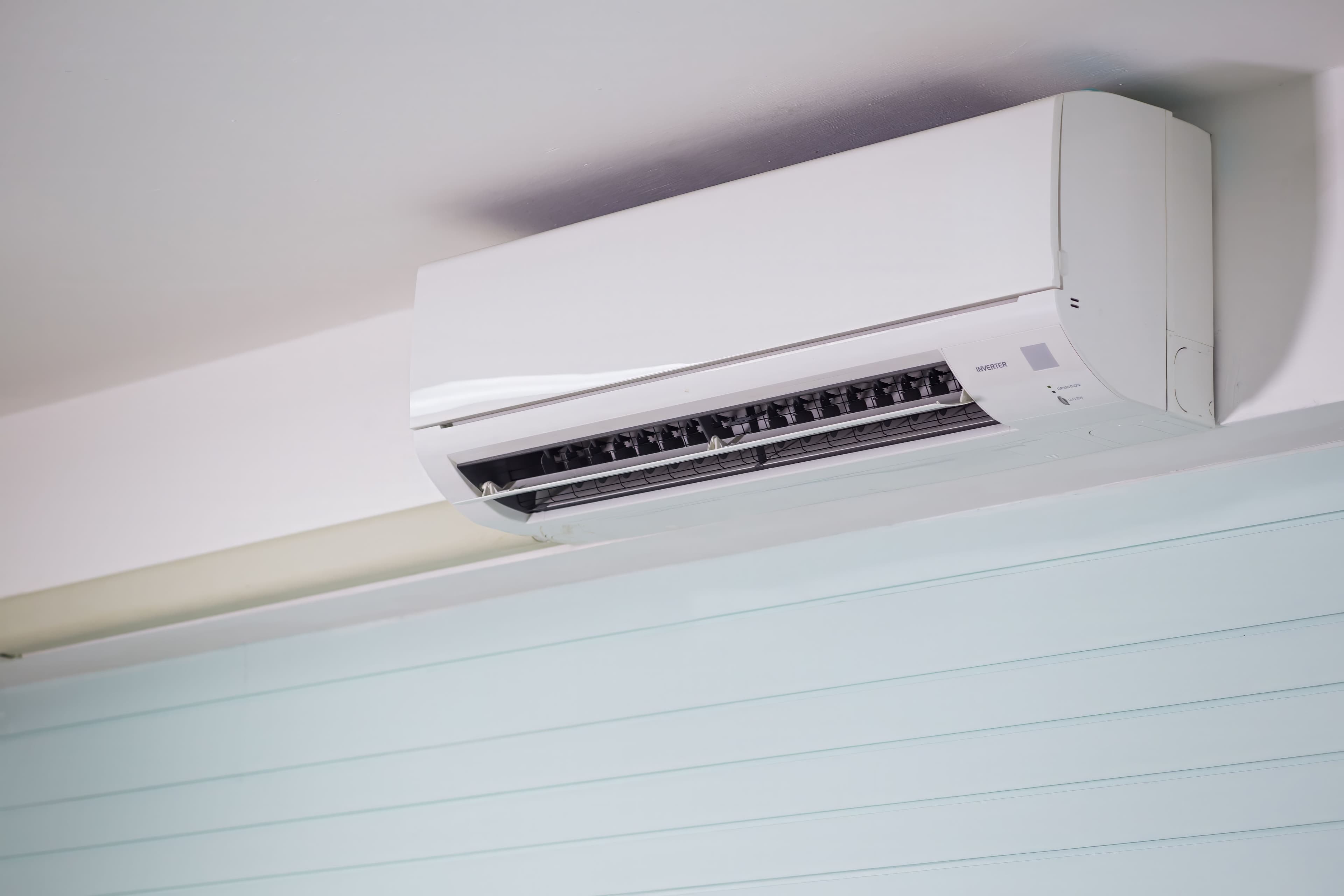 Wall-mounted indoor air conditioner with its air outlet open